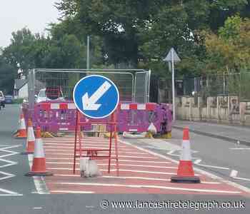 Why are there 5 temporary traffic lights on Preston New Road?