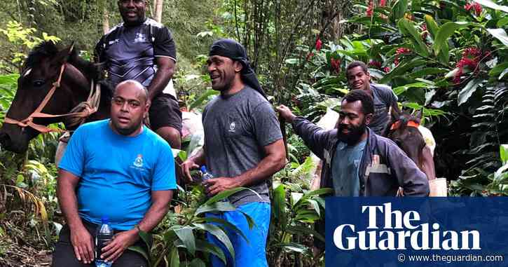 Vaccines on horseback: Fiji doctors take long and muddy road to protect remote villages from Covid