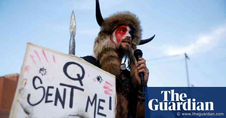 US Capitol rioter photographed wearing horns pleads guilty