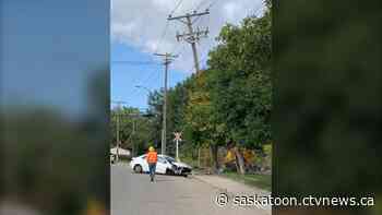 Saskatoon vehicle crash into power pole leads to downed lines