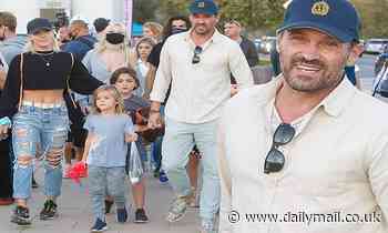 Brian Austin Green and girlfriend Sharna Burgess attend the Malibu Chili Cook Off - Daily Mail