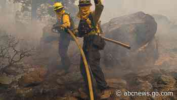 Huge wildfire near Lake Tahoe slows as weather improves