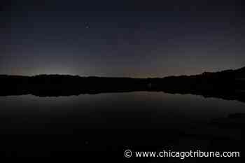 Landmarks: Dark skies loom over Mount Forest Island, and that's a good thing - Chicago Tribune