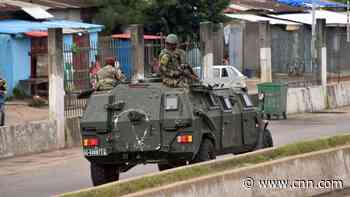 Guinean military officer says President  Alpha Conde arrested, as apparent coup unfolds