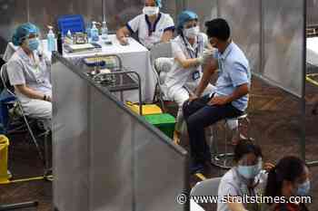Coronavirus: Vietnam sets deadline to vaccinate biggest cities' adults - The Straits Times