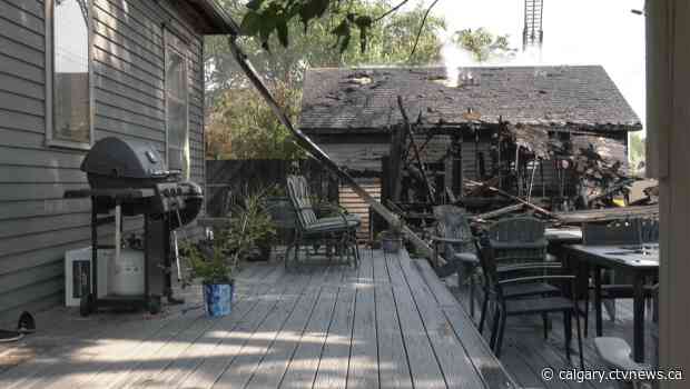 Fire tears through garages, damages south Lethbridge home