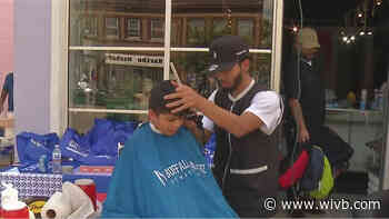 Buffalo record label gets kids ready for school with backpacks and haircuts