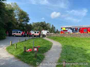 Man and dog rescued after getting stuck on ledge near reservoir