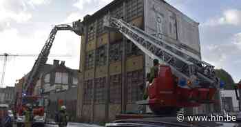Uitslaande brand in industrieel kraakpand in Anderlecht | Brussel | hln.be - Het Laatste Nieuws
