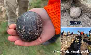 Archaeology: Polished stone balls thought to be 5,500 years old are discovered in Orkney tomb 