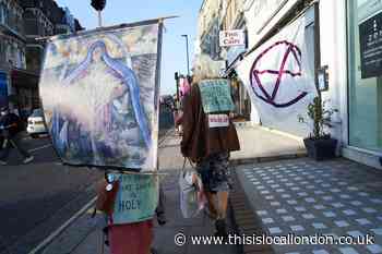 Vicar joins climate march from London to Glasgow