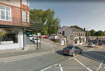 Man charged after two suspected firearms found at Ramsbottom house - The Bolton News