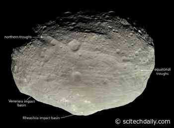 What Created the Mysterious Giant Troughs on Asteroid Vesta? New Theory Proposed
