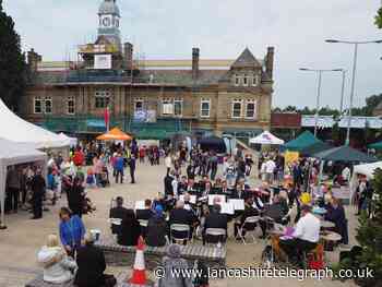 Super heroes and villains descend on Darwen Market Square for family fun day
