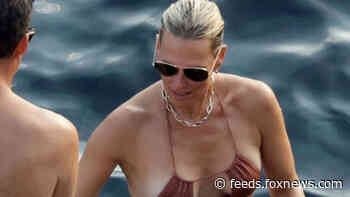 Molly Sims, 48, showcases youthful physique in a string bikini amid romantic trip to Italy