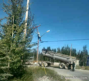 Car collides with power pole, lights out in Fort Providence - Northern News Services