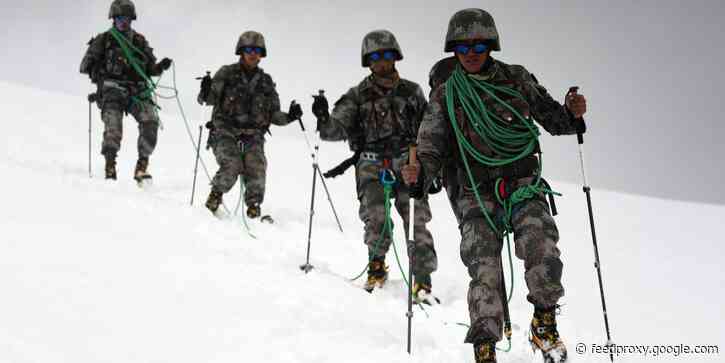 Chinese troops tested out new weapons in a drill near disputed border with India