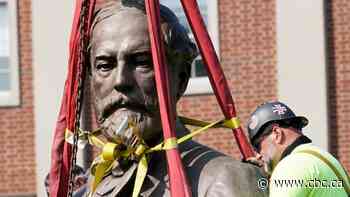 Massive statue of Robert E. Lee removed, after towering over Virginia capital for 100 years