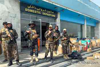 Dozens of Westerners board commercial flight from Kabul