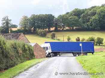 Jackknifed lorry blocks Herefordshire road
