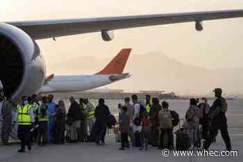 About 200 Westerners, including Americans, fly out of Kabul