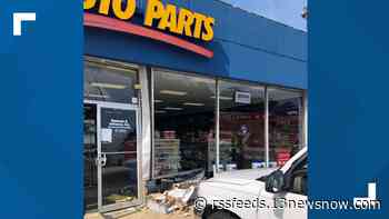 Police: Vehicle hit auto parts store and tractor-trailer overturns in Suffolk
