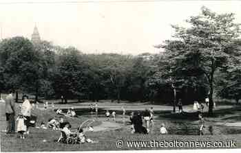 Having a splashing time in the sunshine at Queen's Park in Bolton