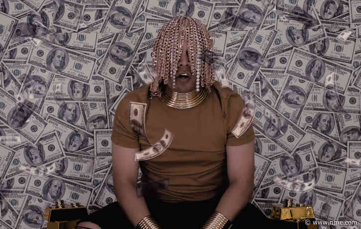 Rapper Dan Sur claims to be first with gold chain hooks implanted into scalp