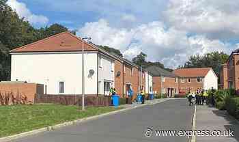 Police in tense four-hour rooftop standoff with youth after 'car theft' - Express
