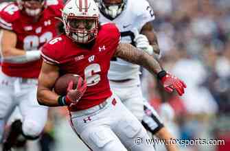 Wisconsin tallies 352 yards on the ground in 34-7 win over Eastern Michigan