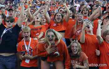 Medical expert weighs in on spread of COVID-19 at college football games - WTOP