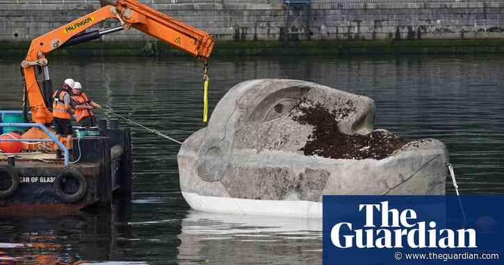 Three-decade-old Floating Head sculpture revived in Glasgow