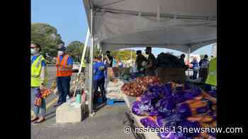 Hundreds of military families line up at drive-through food bank