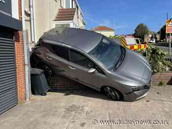 Road closed after electric car crashes into wall in Coseley - Dudley News