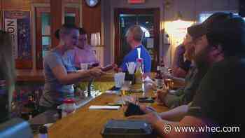 With COVID-19 protocols eased, business owners welcome back Sunday football customers