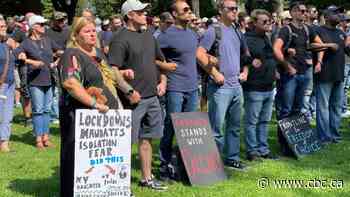 Dozens of protesters in Toronto gather for planned demonstrations outside hospitals
