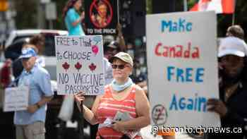 Anti-vaccine protesters now gathered outside Toronto General Hospital