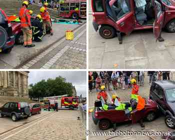 Firefighters stage two car crash in Bolton town centre - The Bolton News