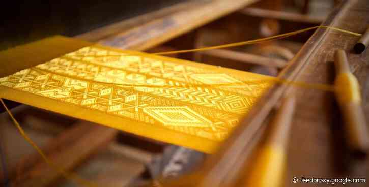 See a golden shawl made from the silk of 2 million spiders