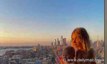 Elsa Hosk goes completely nude for stunning snaps with her daughter Tuulikki in front of NYC views