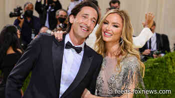 Georgina Chapman cozies up to boyfriend Adrien Brody at Met Gala