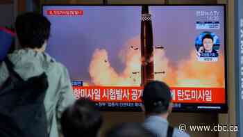Rival Koreas test missiles hours apart, raising tensions