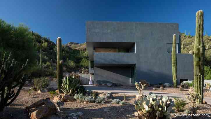 Concrete home by HK Associates looks onto the Arizona desert
