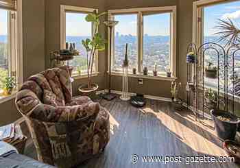 Buying Here: Perry Hilltop condo with spectacular views priced under $190,000