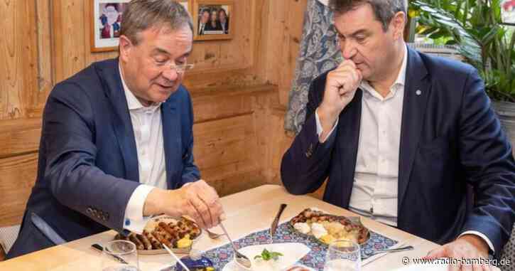 Laschet isst in Söders Heimatstadt Nürnberger Bratwürste