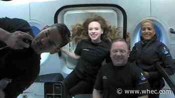 SpaceX crews posts first photos from orbit