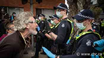 Police in Melbourne clash with anti-lockdown protesters as Australia's COVID-19 cases rise