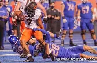 Jaylen Warren’s 218 rushing yards lead Oklahoma State to 21-20 win over Boise State