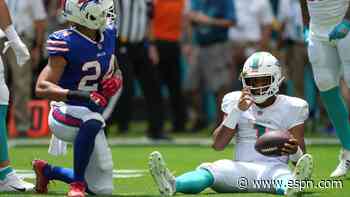 Dolphins QB Tagovailoa carted off with rib injury