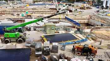 Transurban to control WestConnex; ASX falls as iron ore slump hits miners